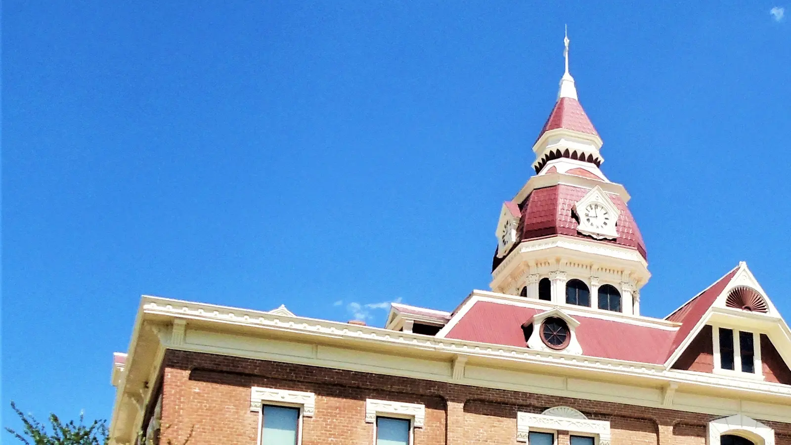 The 1891 Pinal County Courthouse and its red-roofed clock tower in historic Florence, Arizona