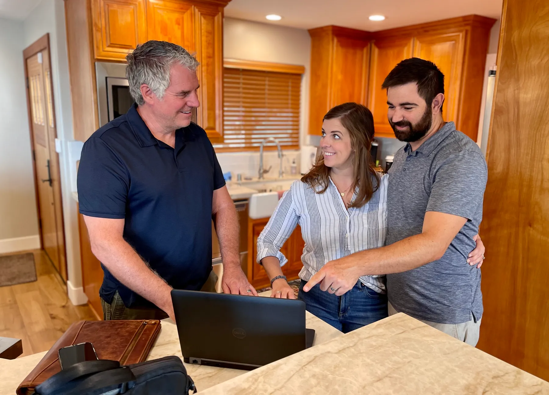 Bob Clardy reviewing an inspection report with clients